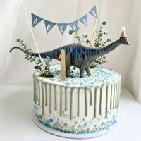 Dinotorte blau mit Wimpelkette